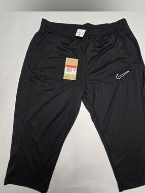 Nike Black Cropped Athletic Pants with White Swoosh